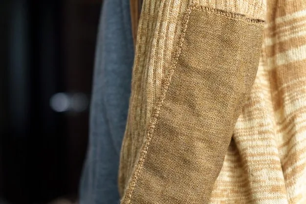 A close-up shot showcasing various fabric textures and colors of wide-leg pants, including linen, denim, and silk.