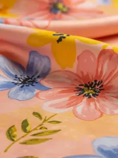 Vibrant spring floral pattern on silk fabric, modern botanical design