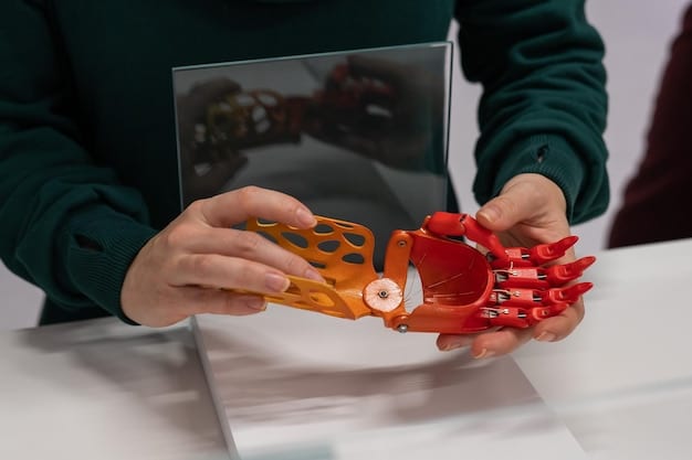A close-up shot of the designer's hands working on a tactile prototype, made from various materials like wood, foam, and textured fabrics. The focus is on the hands manipulating the prototype, showcasing the attention to detail and the tactile nature of the design process.