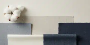 Assortment of natural fabric swatches showcasing cotton, linen, silk, and wool textures.