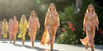 Summer 2026 Collection Debuts: Top Brands Preview June Releases Models on a runway presenting new summer fashion collection with bright colors and light fabrics.