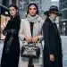Luxurious winter 2026 accessories displayed on models in a chic urban setting.
