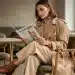 Woman reviewing Pre-Fall 2026 collection trends
